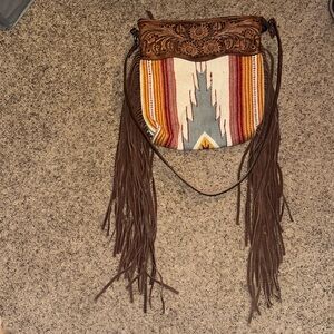 Saddle blanket fringe purse